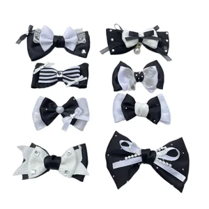 Eight-piece set of black and white bow hair clips with pearls and lace detail