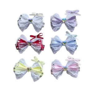 Set di 6 fiocchi in pizzo colorati con strass a cuore per fermagli e bambole