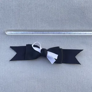 Handmade black and white striped ribbon bow accessory for DIY crafts and hair ornaments