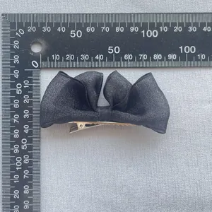 Elegant black mesh bow hair clip for girls with size measurement of 10cm width