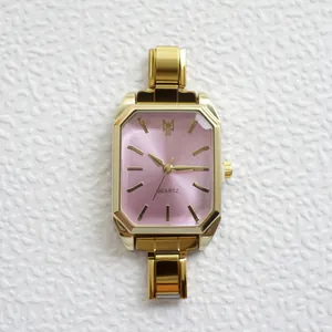 Orologio al quarzo ottagonale dorato con quadrante rosa e cinturino modulare