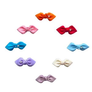 Set of 8 colorful grosgrain ribbon bows with sparkling star centers for hair and fashion