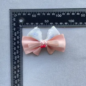 Handmade floral bow hair clip with satin fabric and resin cherry detail for girls