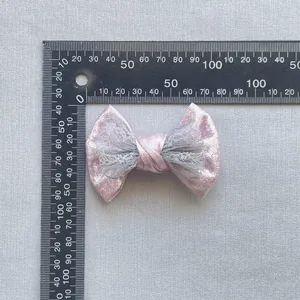 Accessorio capelli fiocco doppio in pizzo glitter rosa misura 6,5 cm per 4,5 cm