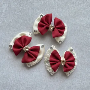Detailed set of three bows with heart rhinestones and lace for hair and clothing accessories