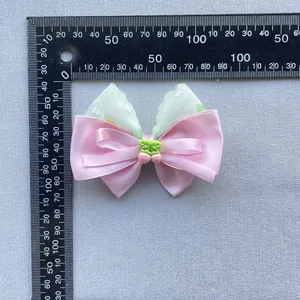 Floral bow hair accessory with strawberry charm and pink ribbon, 8cm measurement view