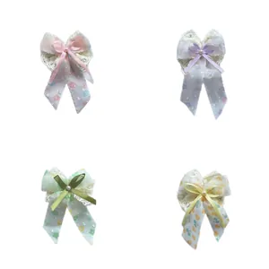 Barrettes à cheveux nœud en dentelle avec perles et glands en quatre tons pastels