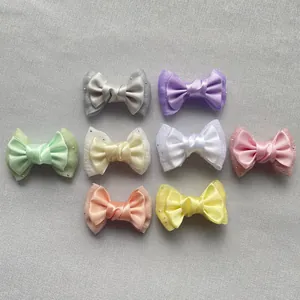 Detail of 8pcs double-layer satin and organza bow clips with sparkling silver rhinestones