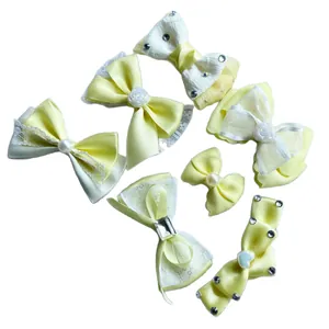 Set of 6 yellow and white crystal bow accessories with pearls for DIY headwear and crafts