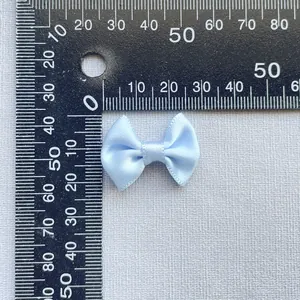 25mm light blue satin ribbon bow for DIY crafts and hair accessories on white background