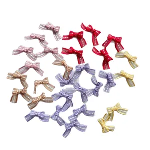 Colorful 1.5cm mini fabric bows with white stitched edges for DIY crafts and doll clothing
