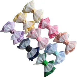 Handgefertigte Glitzerschleifen aus Mesh in verschiedenen Farben mit Organza und Ripsband