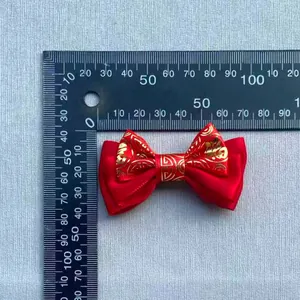 Detail showing red satin DIY bow dimensions 45mm x 25mm with gold Fu character