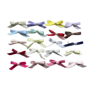 Set of 20 colorful mini polyester ribbon bows with pearl center for cake toppers and DIY crafts