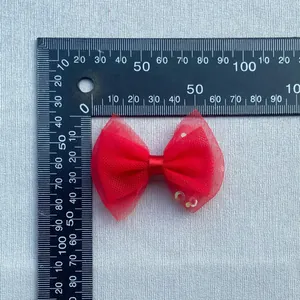 Detailed size measurement of a 6.5cm double-layer red mesh bow with sequins for DIY crafts