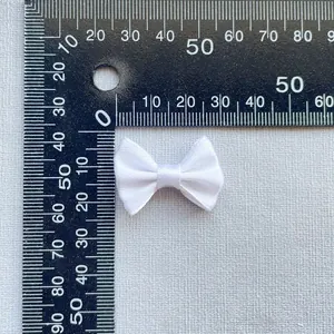 Detailed size measurement of 3cm white satin ribbon bow for DIY accessories and crafts