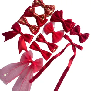 Red bow DIY accessory set with satin and lace fabrics for hair clips and apparel