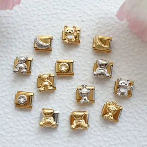 Detailed view of DIY Italian charm bracelets with bear and croissant shaped metal links