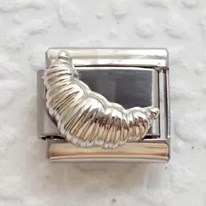 Italian charms bracelet link with 3D croissant charm in polished stainless steel finish