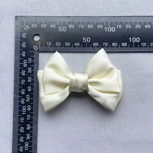 Cream satin ribbon bow decoration for apparel and gift boxes, 85mm wide accessory