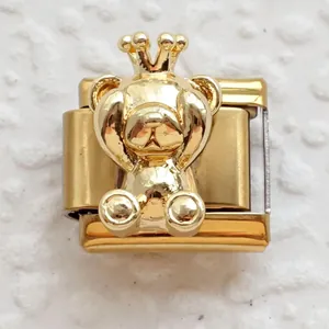 Macro shot of gold teddy bear charm with crown for Italian modular charm bracelets