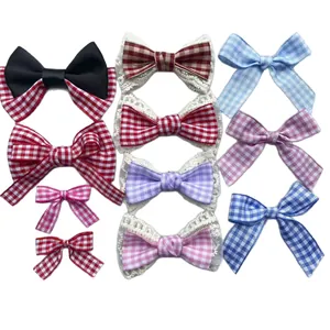 Set of plaid bow hair accessories with lace trim in multiple colors and sizes