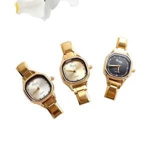 Gouden achthoekige quartz horlogeset met witte, zwarte en gouden wijzerplaten voor dames
