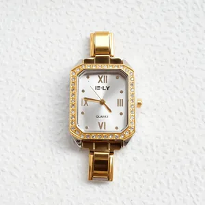 Orologio quarzo donna con cassa rettangolare in cristallo e cinturino dorato a maglie H