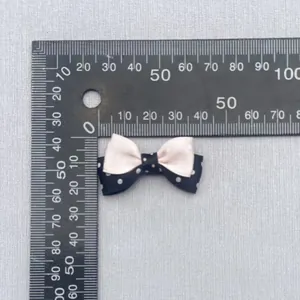 Polka dot layered ribbon bow in black and pink for hair clips and DIY crafts