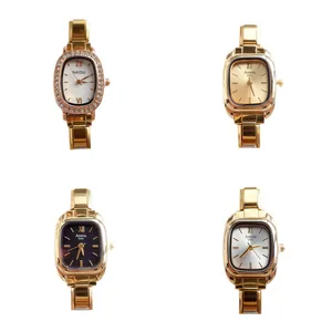Dameshorloges met gouden schakelarmband, kristallen ring en diverse wijzerplaten