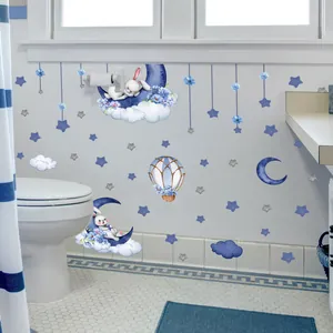 Leuchtende blaue Wandsticker mit Hase, Mond und Sternen für Kinderzimmer-Deko