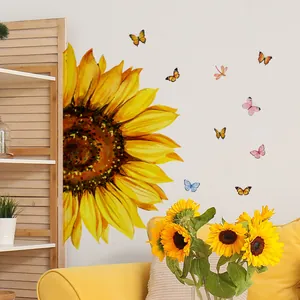 Detail of sunflower and butterfly wall stickers in a modern minimalist living room setting