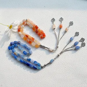 Pulsera Tasbih de 33 cuentas de colores con borlas plateadas y colgantes de nudo celta