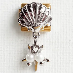 Italian modular charm bracelet with gold base and silver shell with double pearls