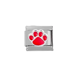 Detail of Italian charm link featuring a vibrant red paw print on stainless steel