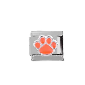 Detail of 304 stainless steel Italian charm link with orange enamel dog paw print