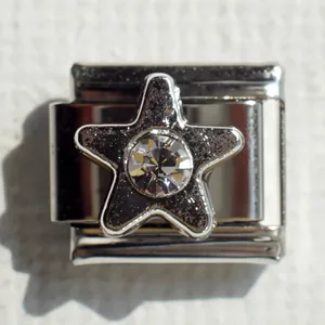 Macro de charm italiano de acero con estrella de purpurina negra y cristal central
