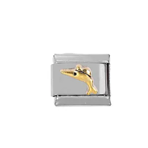 Close-up of stainless steel Italian charm link featuring a golden dolphin motif