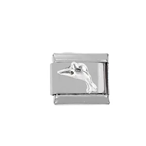 Macro shot of stainless steel Italian charm link with embossed dolphin detail