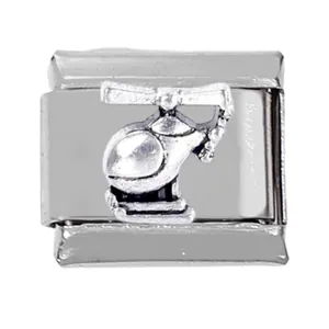 Detailed macro view of a 304 stainless steel Italian charm link with a 3D helicopter design