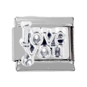 Macro detail of Italian charm bracelet link in stainless steel with I love you engraving
