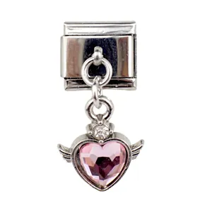 Detail of pink crystal heart charm with silver wings on modular stainless steel link