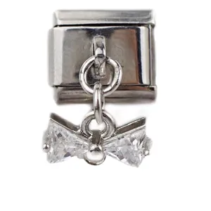 Italiaanse stijl bedelarmband link in zilver met een vleugel- en strikhanger met kristallen