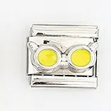Detail of stainless steel Italian charm link with a yellow cartoon goggle design
