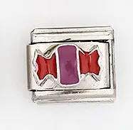 Macro shot of Italian charm link featuring a candy design in purple and red enamel