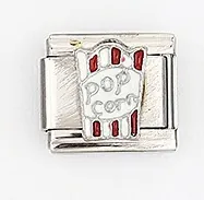 Close-up of Italian charm link featuring popcorn bucket design in red and white enamel