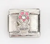 Detailed view of Italian charm link with pink flower enamel and sparkling crystal inlay