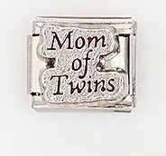Detail shot of modular stainless steel charm link engraved with Mom of Twins text
