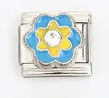 Detail of blue and yellow floral Italian charm link with a centered crystal stone