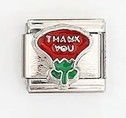 Macro shot of stainless steel Italian charm with red flower and THANK YOU lettering